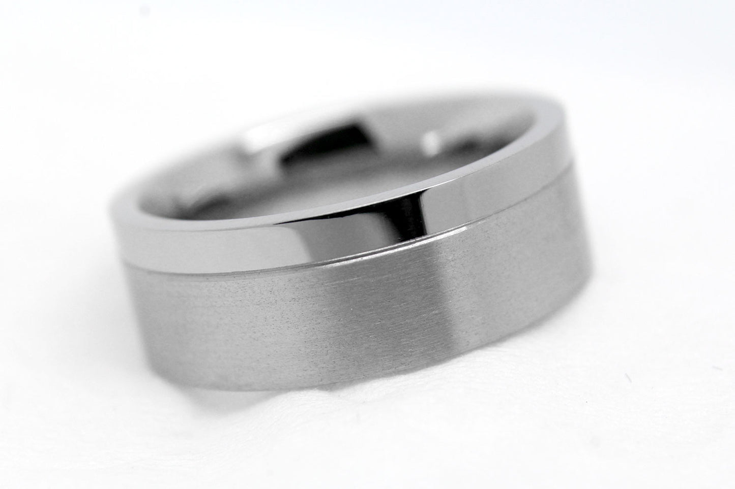 Titanium ring on a white background
