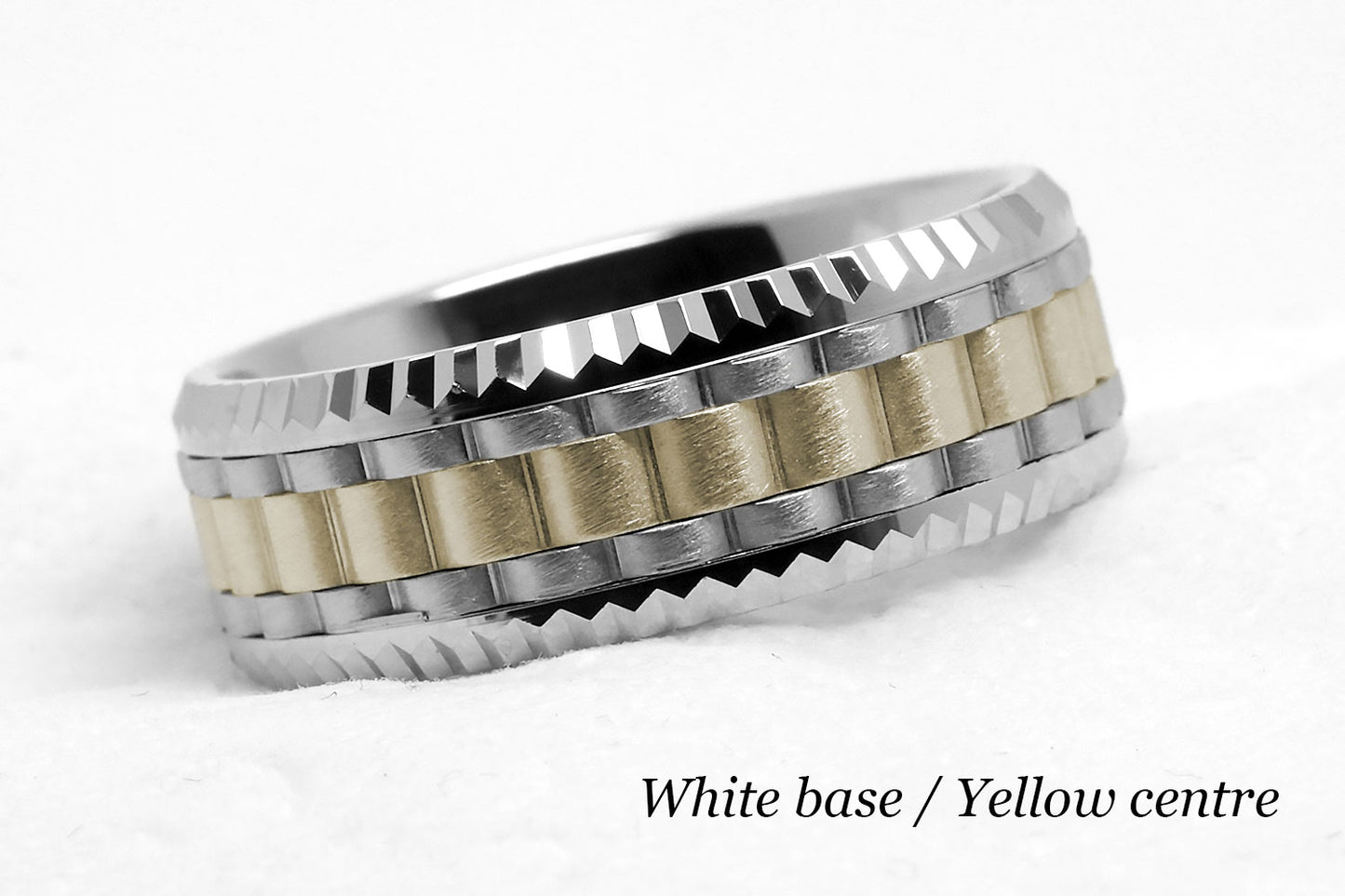 Luxury Heavy faceted solid gold wedding ring for men. Faceted carlex ring. White gold base and yellow gold centre.