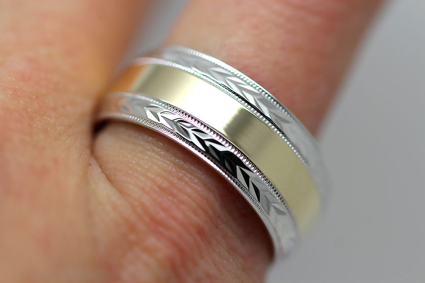 polished flat wedding and for men with wheat design in white gold base and yellow gold centre