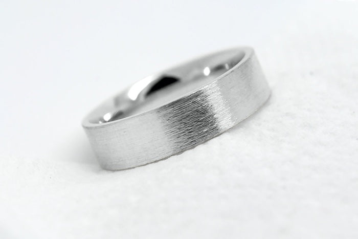 solid white gold wedding band for men and women with flat deep brush finish