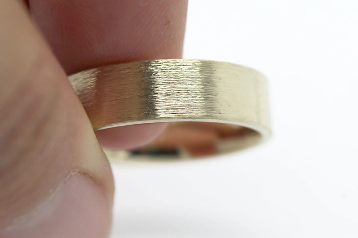 solid yellow gold wedding ring for men and women with flat deep brush finish