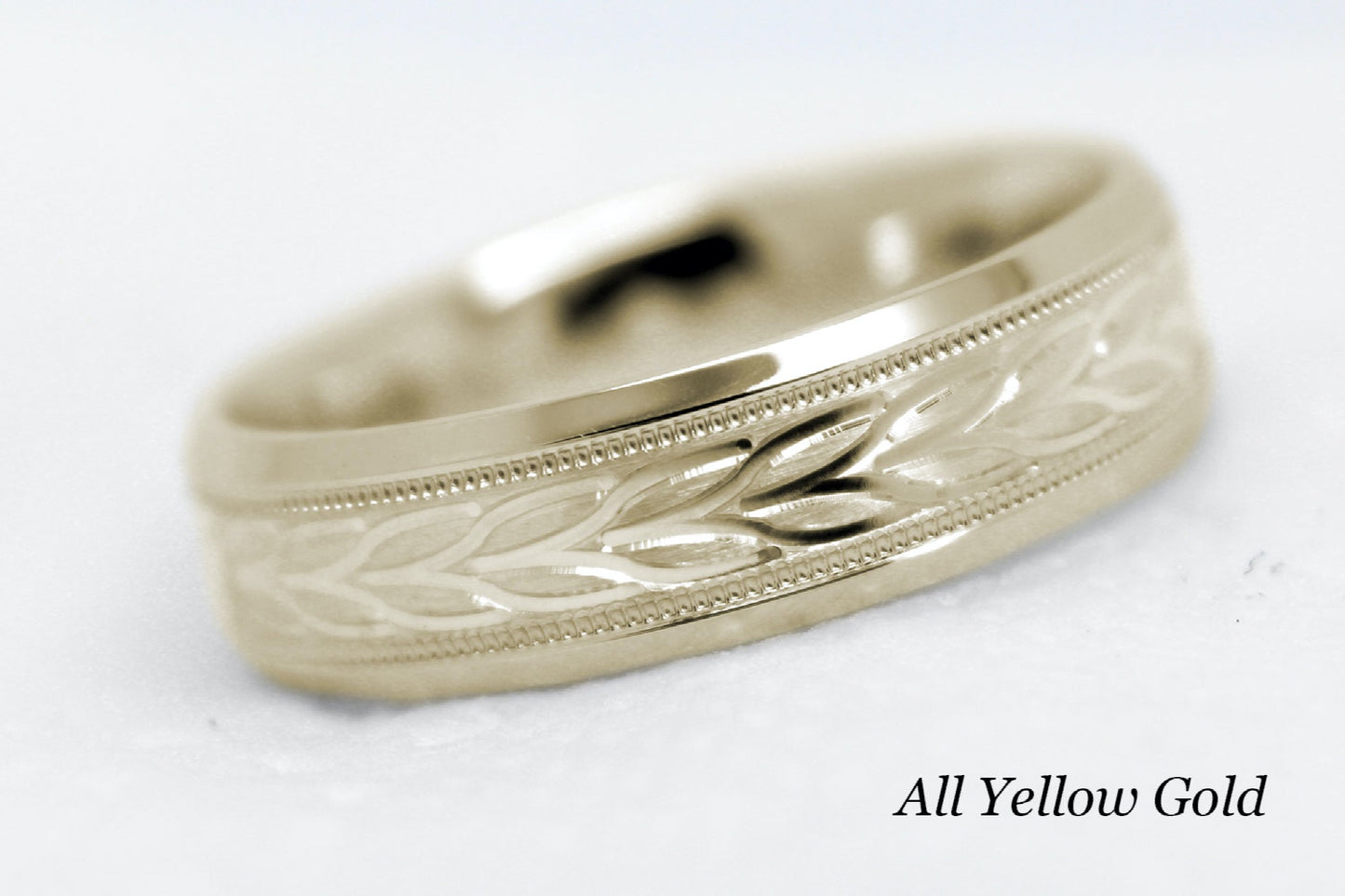 yellow gold beveled wedding band for men with beveled and floral brushed design