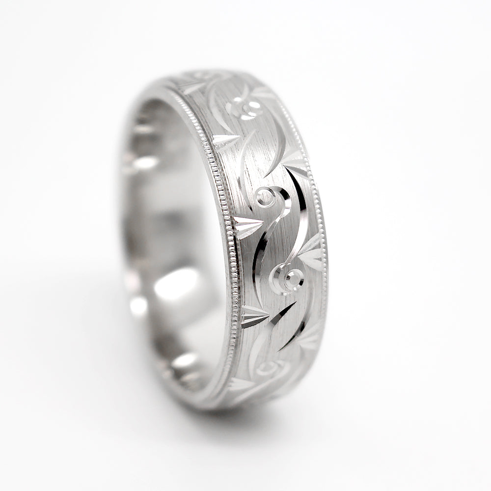 Solid gold infinity filigree wedding band for men and women in white gold
