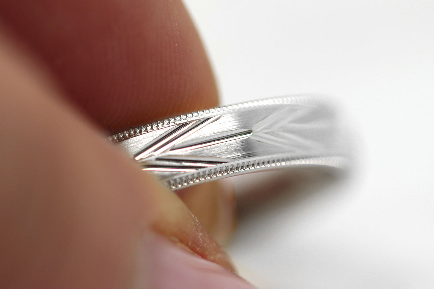 4mm solid 925 sterling silver wedding band, featuring brushed centre with incut arrows design and milgrain edge, the wedding band is with rhodium plating
