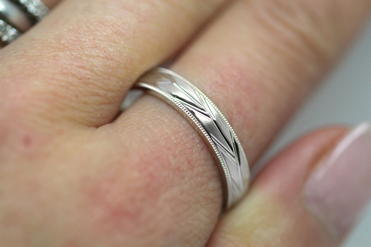 4mm solid 925 sterling silver wedding band, featuring brushed centre with incut arrows design and milgrain edge, the wedding band is with rhodium plating
