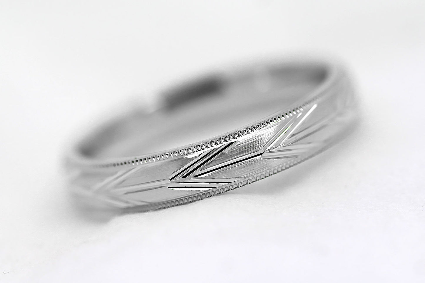 4mm solid 925 sterling silver wedding band, featuring brushed centre with incut arrows design and milgrain edge, the wedding band is with rhodium plating