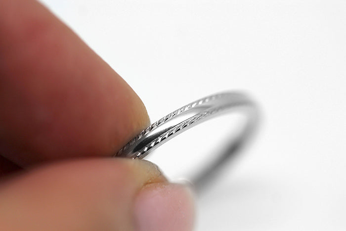 polished and twisted edge silver ring