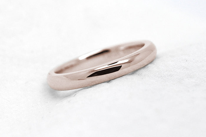 2mm 10K 14K 18K Gold Polished Plain Women's Wedding Ring | 2mm Solid Gold Wedding Ring for Women. Low dome polished finish gives this gold ring an elegant and classic look. Stack it with other rings or wear it alone.