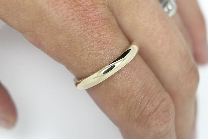 2mm 10K 14K 18K Gold Polished Plain Women's Wedding Ring | 2mm Solid Gold Wedding Ring for Women. Low dome polished finish gives this gold ring an elegant and classic look. Stack it with other rings or wear it alone.