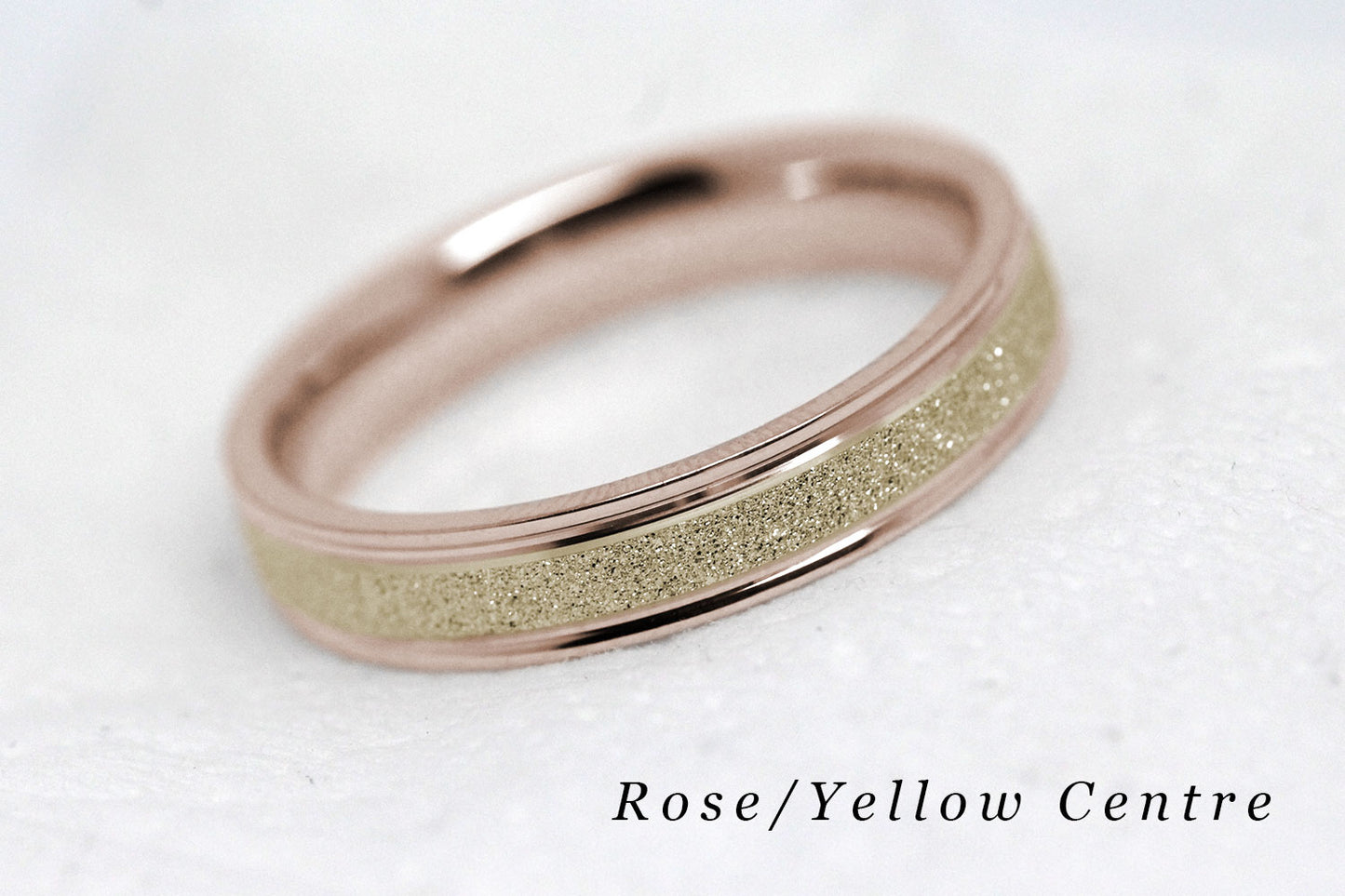 4mm solid gold wedding band for women and men with sparkly yellow gold centre and polished rose gold base and edges, available in 10 karat 14 karat or 18 karat gold