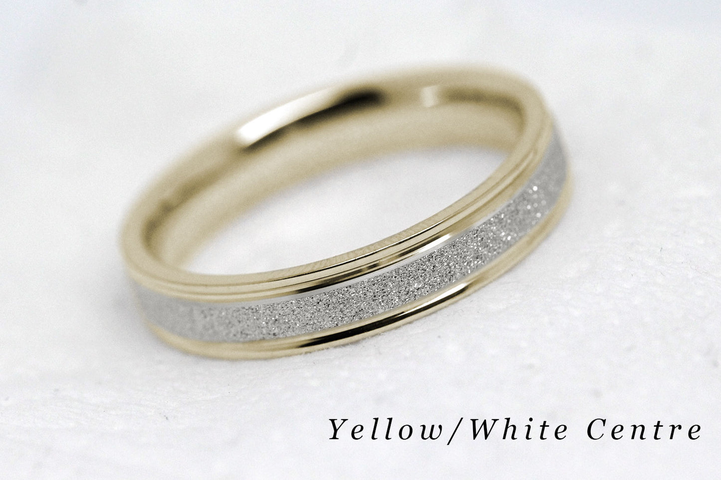 4mm solid gold wedding band for women and men with sparkly white gold centre and polished yellow gold base and edges, available in 10 karat 14 karat or 18 karat gold