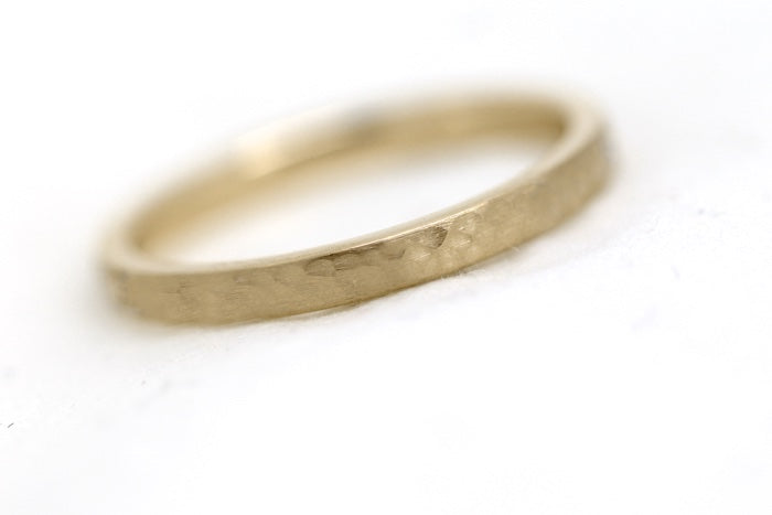 2mm Gold Flat Hammered Wedding Band for Women | AT-0022 | 2mm gold wedding band for women. This stacking 10k gold hammered ring is a stunning piece that's designed to last a lifetime. Perfect as wedding band, anniversary ring, birthday gift, or Valentine'