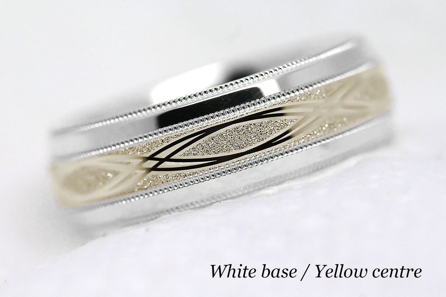 white gold base and yellow gold centre infinity ring