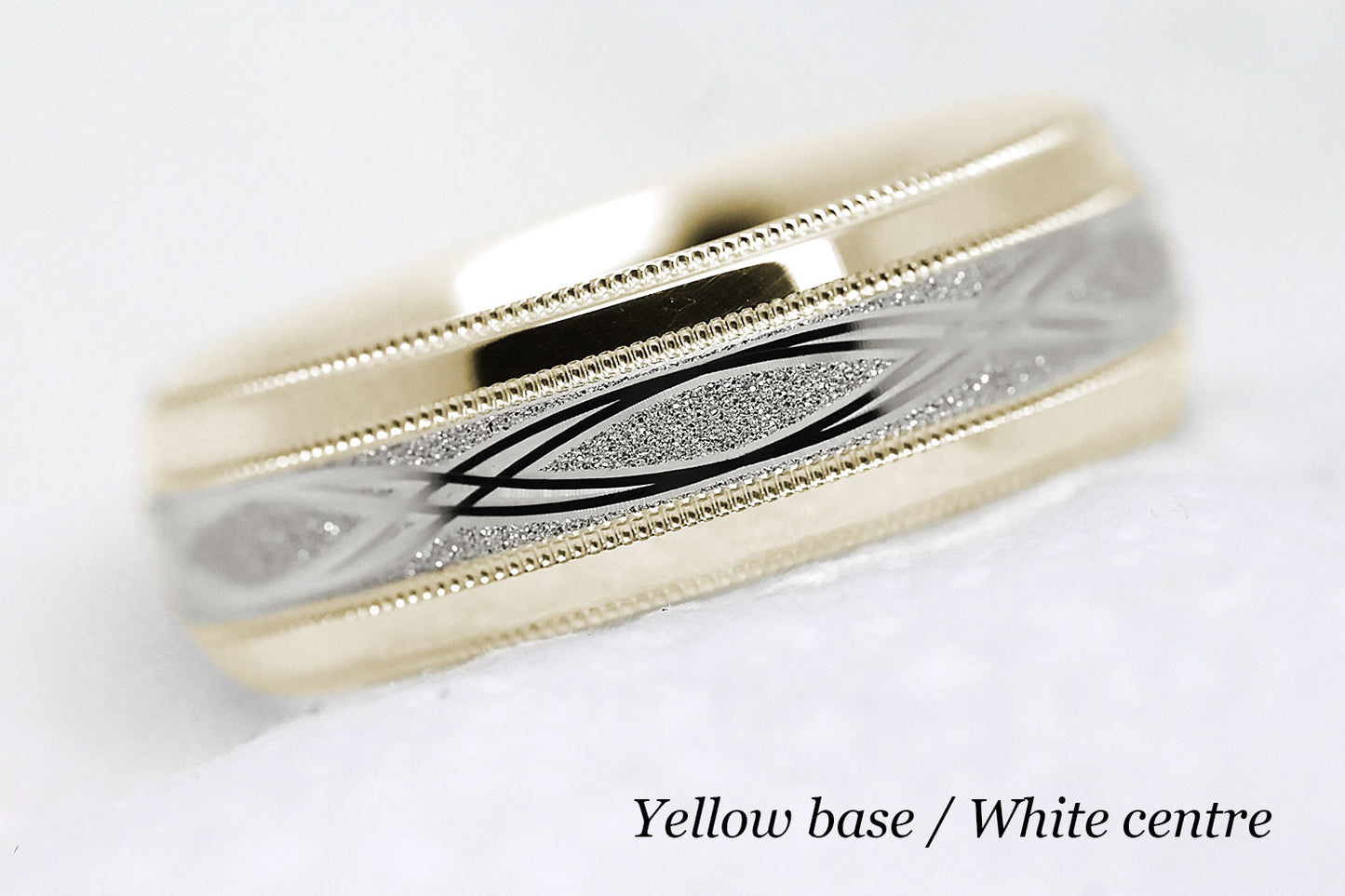 yellow gold base and white gold centre infinity ring
