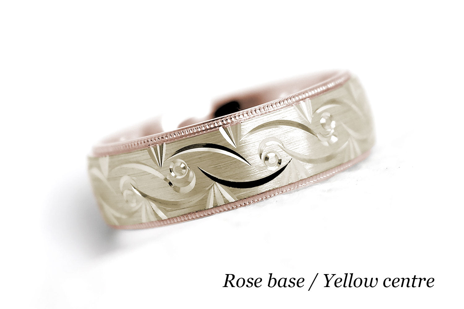 Solid two tone gold wedding band for men and women in rose gold base and yellow gold centre