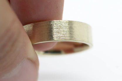 solid yellow gold wedding ring for men and women with flat deep brush finish