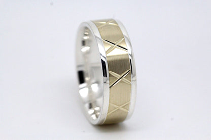 gold wedding band for men in brushed finish centre. X design around the entire ring . White Gold base and yellow gold centre