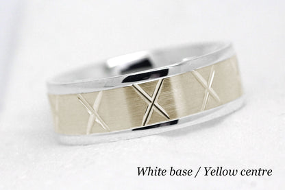 gold wedding band for men in brushed finish centre. X design around the entire ring . White Gold base and yellow gold centre