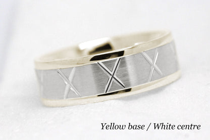 gold wedding band for men in brushed finish centre. X design around the entire ring . Yellow Gold base and White gold centre