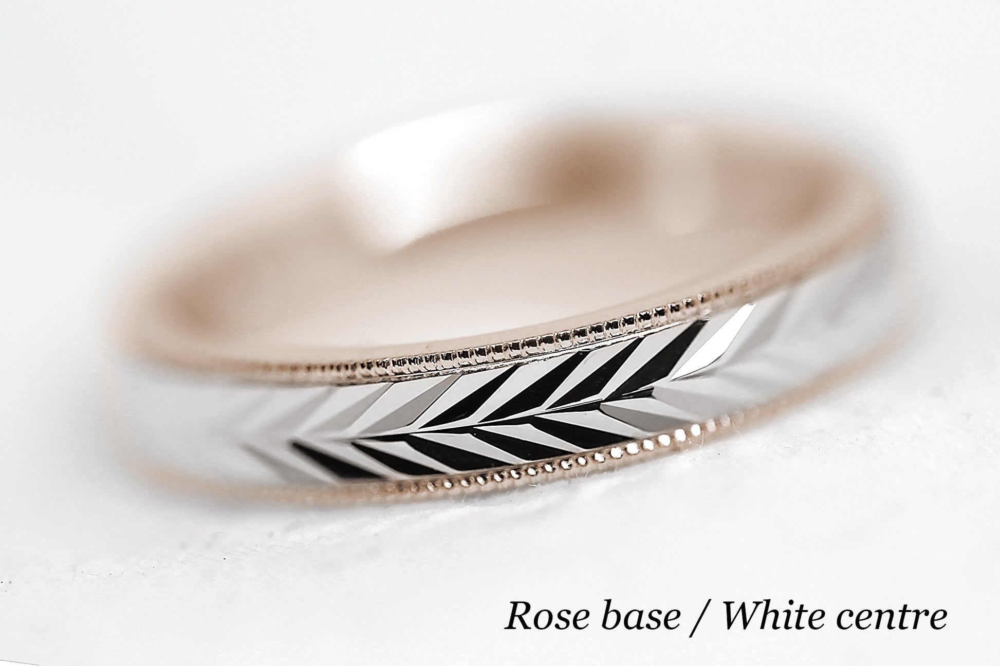 solid gold wedding band for men and women. Wheat Design, faceted and reflective centre is handcrafted in Montreal. Rose Gold base and White gold centre in solid 10k 14k or 18k gold