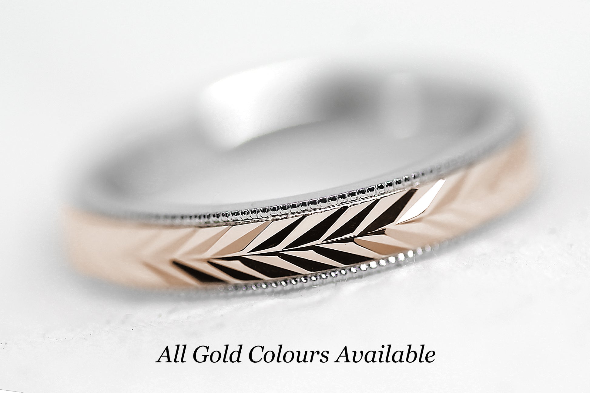solid gold wedding band for men and women. Wheat Design, faceted and reflective centre is handcrafted in Montreal. White Gold base and rose gold centre in solid 10k 14k or 18k gold