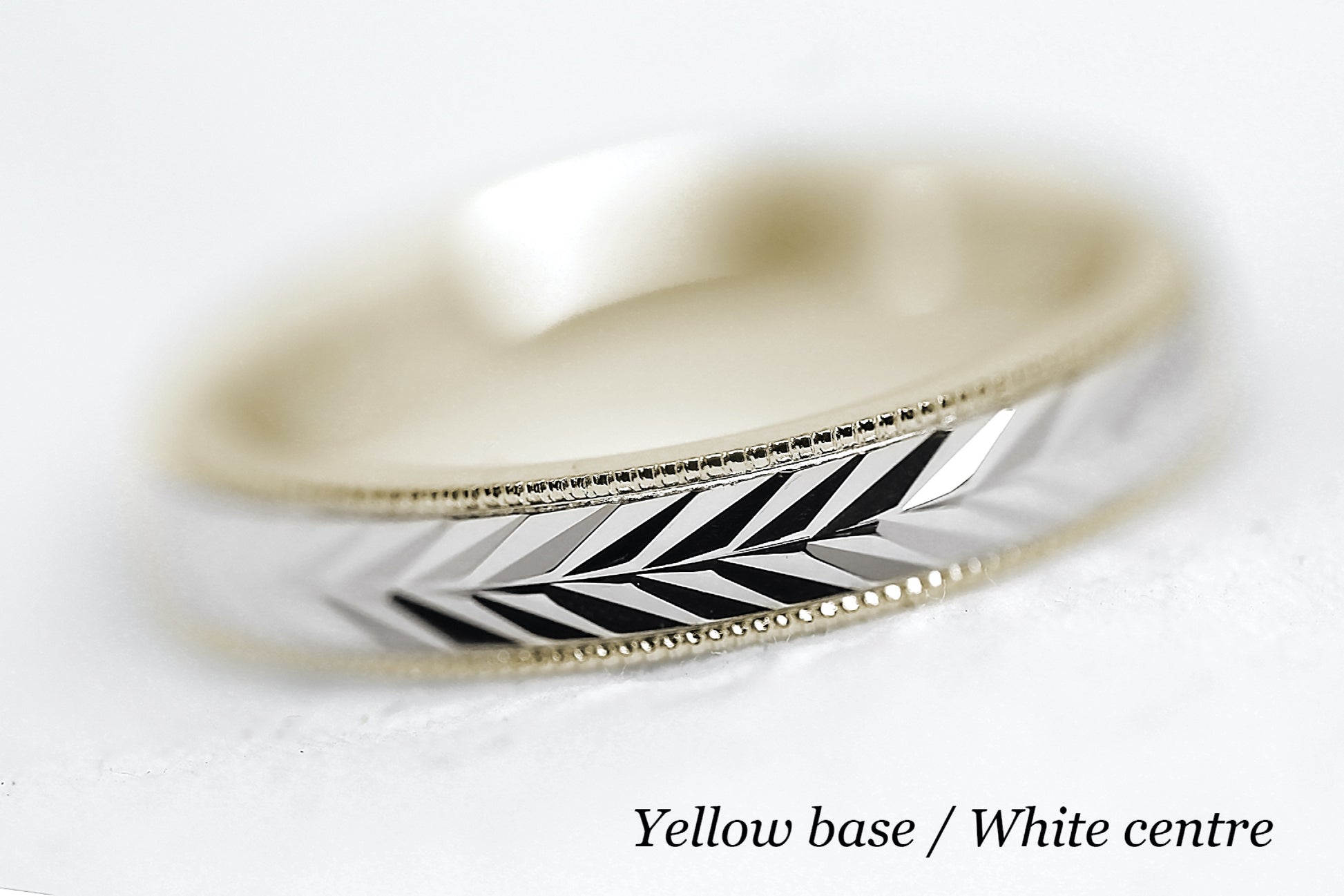 solid gold wedding band for men and women. Wheat Design, faceted and reflective centre is handcrafted in Montreal. Yellow Gold base and white gold centre in solid 10k 14k or 18k gold
