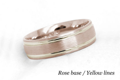 solid gold wedding band for men and women in rose gold base and yellow gold lines. Brushed finish with polished lines.