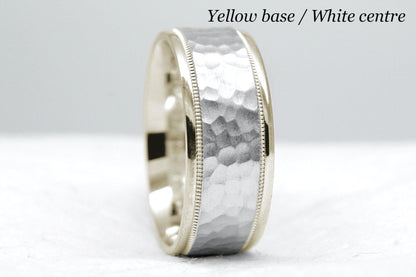 yellow gold base and white gold centre. 8mm hammered wedding band for men and women