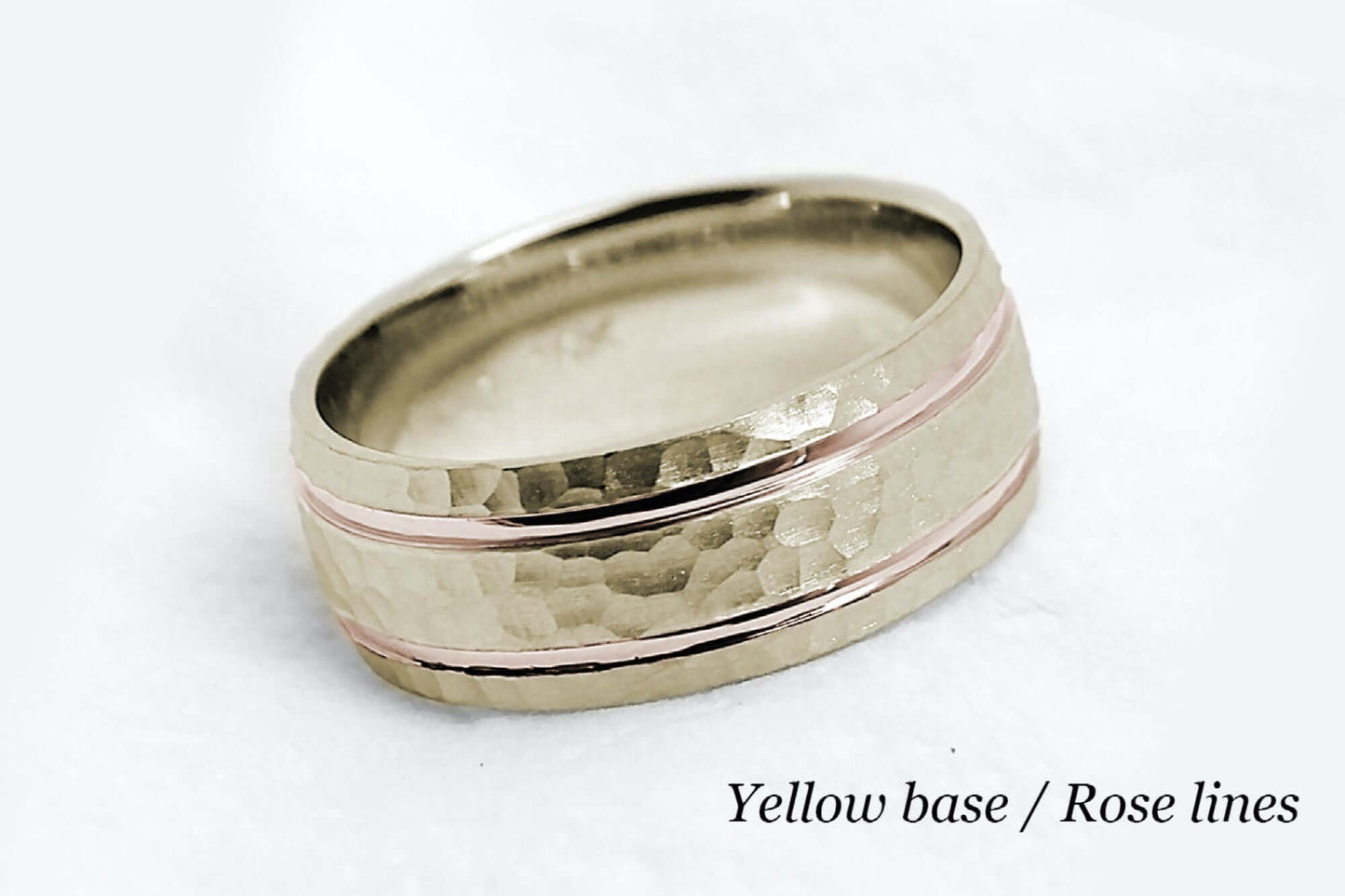 8mm wide Solid yellow gold ring for men featuring hammered finish and rose gold polished lines. Low dome look with comfort fit.