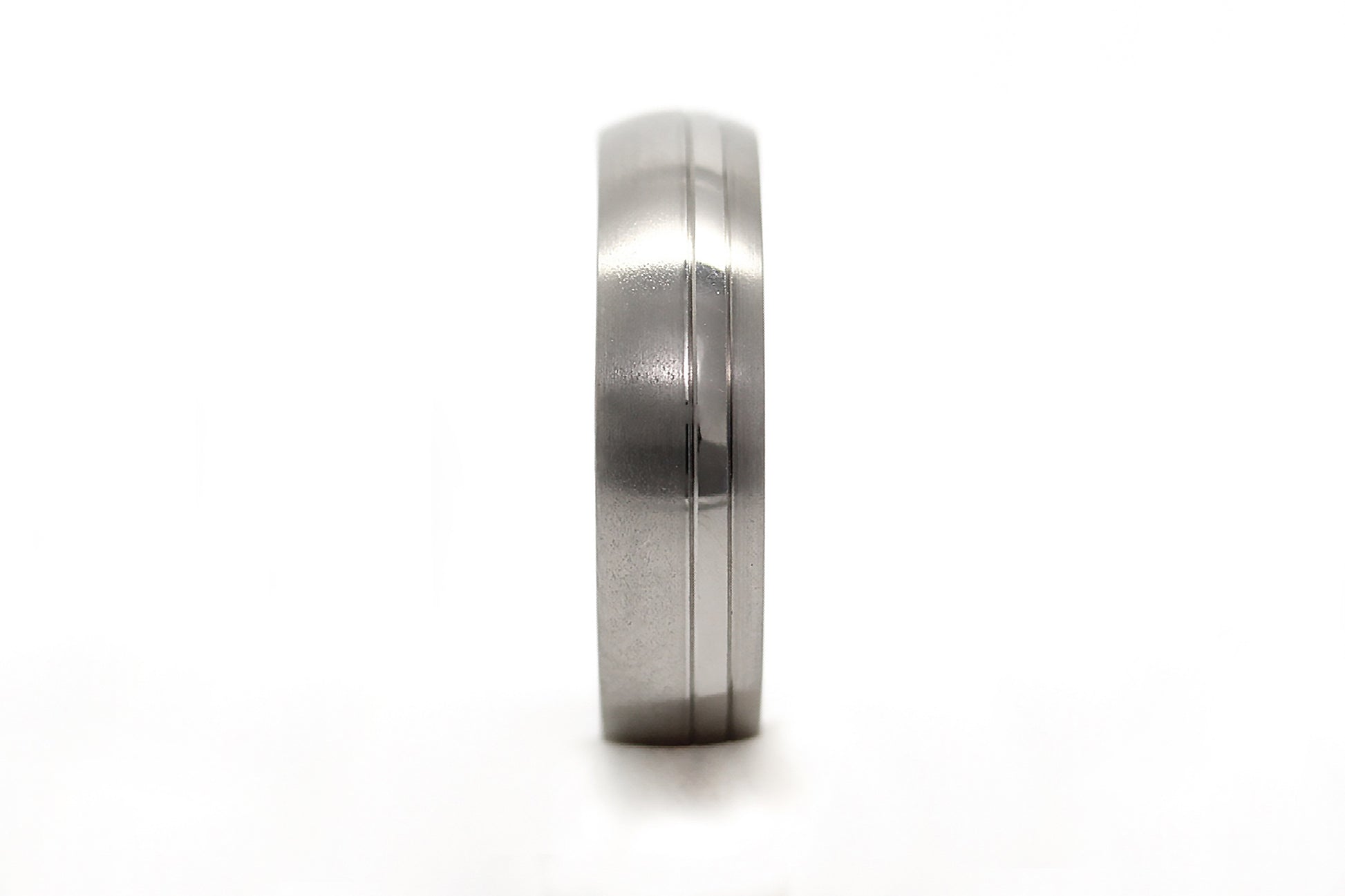 Titanium ring on a white background