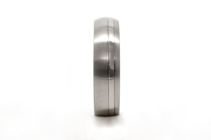 Titanium ring on a white background