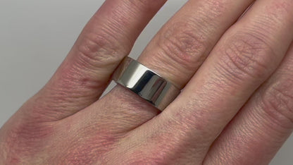 Flat Polished Titanium Ring in 8mm width on the finger