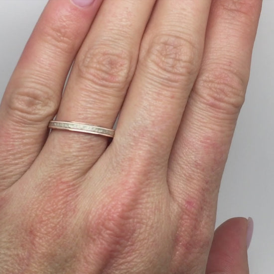 rose gold base white gold centre hammered ring.