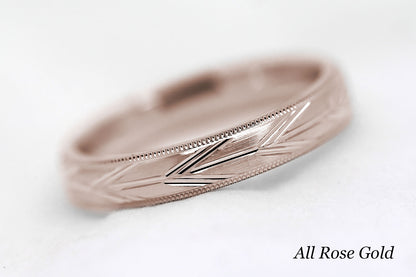 4mm solid gold wedding band in rose gold, featuring brushed centre with incut arrows design and milgrain edge, available in 10k gold 14k gold or 18k gold