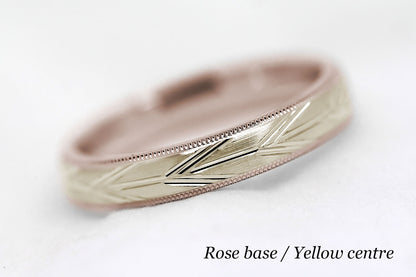 4mm solid gold wedding band with rose gold base and yellow gold centre, featuring brushed centre with incut arrows design and milgrain edge, available in 10k gold 14k gold or 18k gold