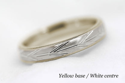 4mm solid gold wedding band with yellow gold base and white gold centre, featuring brushed centre with incut arrows design and milgrain edge, available in 10k gold 14k gold or 18k gold