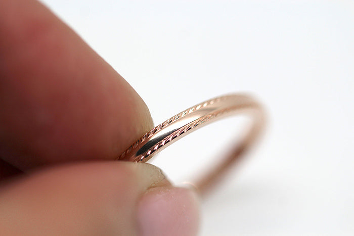 2mm Gold Plain Wedding Band for Women with Twisted edge | 2mm 10K 14K 18K Gold Women's Ring. Polished finish with twisted edges gives this ring an elegant and classic look. Where it alone or stack with other rings