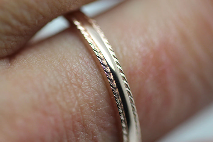 2mm Gold Plain Wedding Band for Women with Twisted edge | 2mm 10K 14K 18K Gold Women's Ring. Polished finish with twisted edges gives this ring an elegant and classic look. Where it alone or stack with other rings
