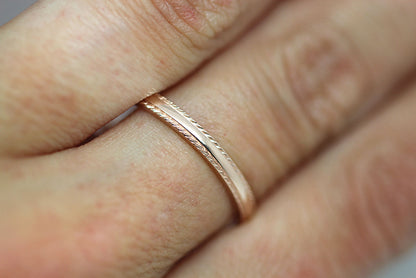 2mm Gold Plain Wedding Band for Women with Twisted edge | 2mm 10K 14K 18K Gold Women's Ring. Polished finish with twisted edges gives this ring an elegant and classic look. Where it alone or stack with other rings