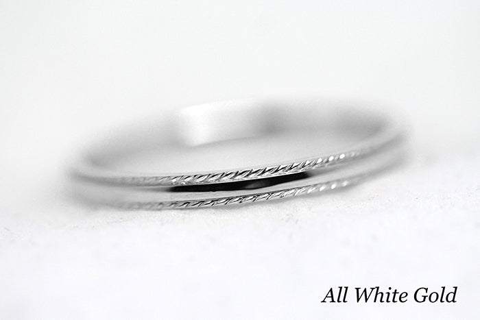 2mm Gold Plain Wedding Band for Women with Twisted edge | 2mm 10K 14K 18K Gold Women's Ring. Polished finish with twisted edges gives this ring an elegant and classic look. Where it alone or stack with other rings