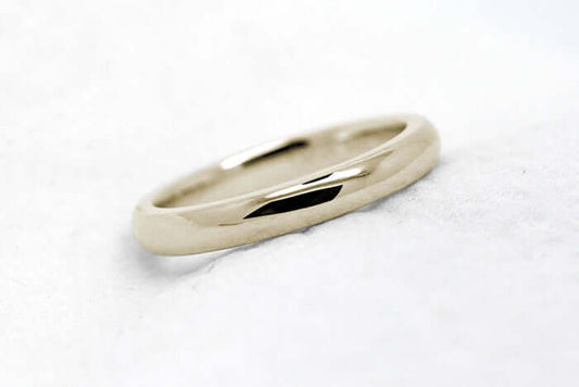 2mm 10K 14K 18K Gold Polished Plain Women's Wedding Ring | 2mm Solid Gold Wedding Ring for Women. Low dome polished finish gives this gold ring an elegant and classic look. Stack it with other rings or wear it alone.