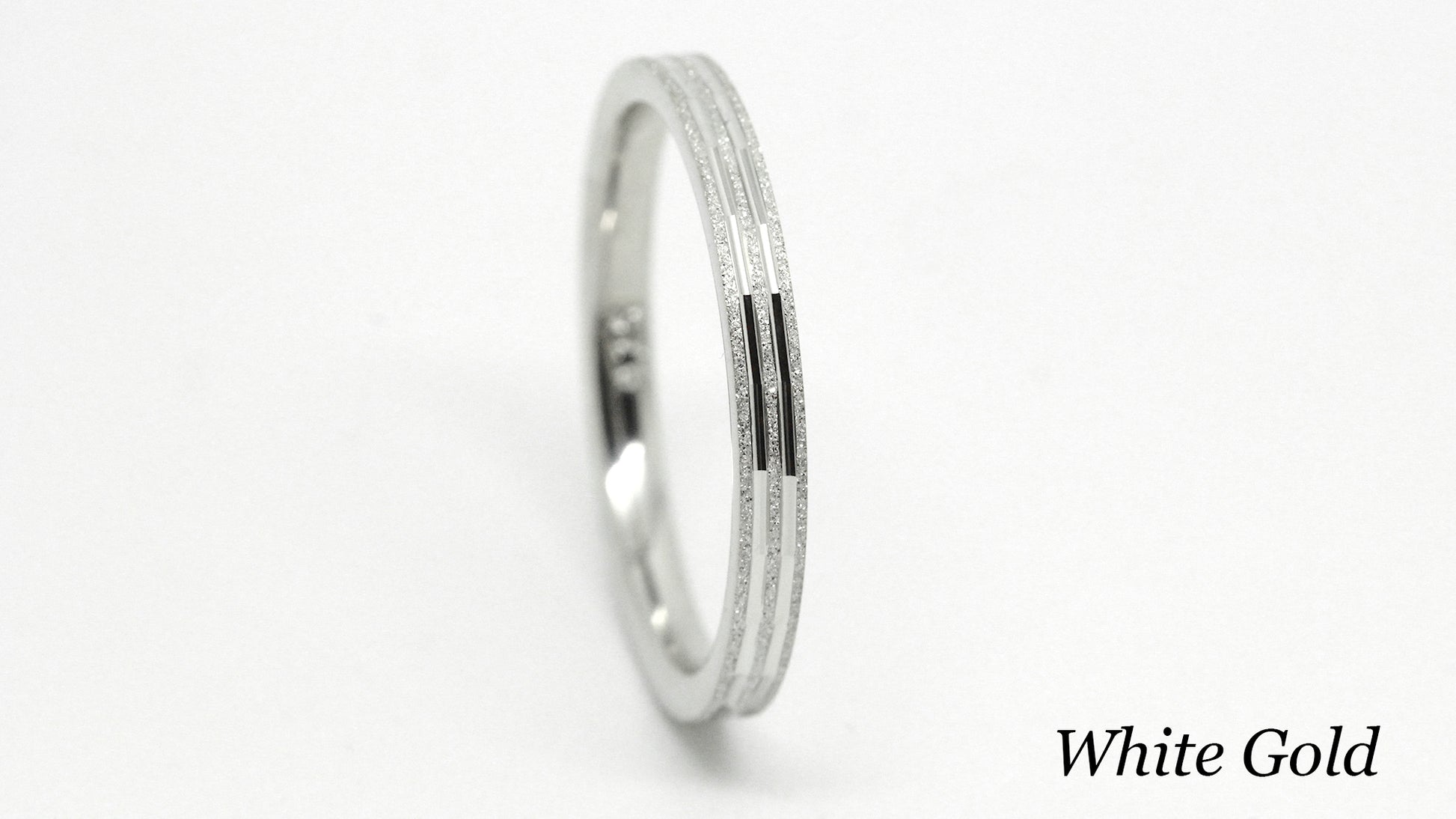 2mm Solid Gold Sparkly Wedding Band for Women with Lines | This stackable wedding ring with sparkly finish is a stunning piece that's designed to last a lifetime. Perfect as wedding band or anniversary ring