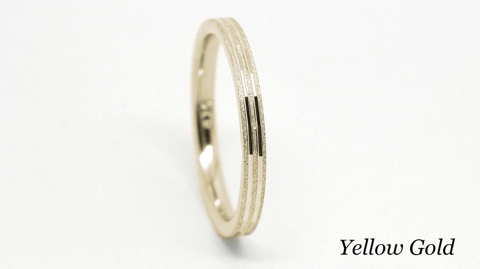 2mm Solid Gold Sparkly Wedding Band for Women with Lines | This stackable wedding ring with sparkly finish is a stunning piece that's designed to last a lifetime. Perfect as wedding band or anniversary ring