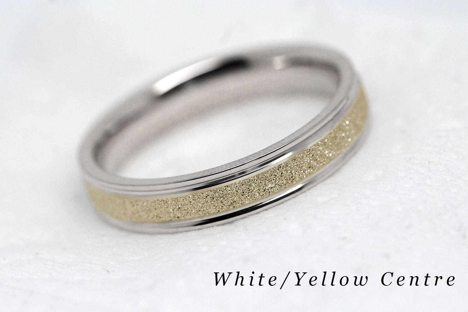 4mm solid gold wedding band for women and men with sparkly yellow gold centre and polished white gold base and edges, available in 10 karat 14 karat or 18 karat gold