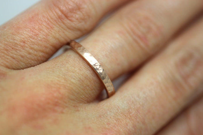 2mm Gold Flat Hammered Wedding Band for Women | AT-0022 | 2mm gold wedding band for women. This stacking 10k gold hammered ring is a stunning piece that's designed to last a lifetime. Perfect as wedding band, anniversary ring, birthday gift, or Valentine'