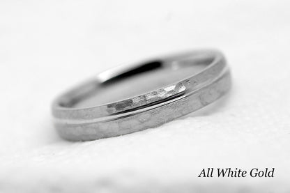 4mm 10 karat 14 karat or 18 karat solid gold hammered wedding band in white gold with off centre white gold polished line