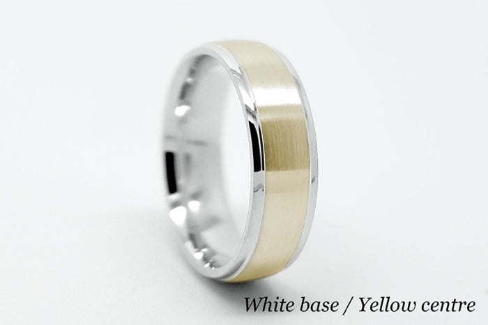 Elegant white gold base wedding ring with yellow gold centre, featuring a brushed finish and polished edges, perfect for special occasions.
