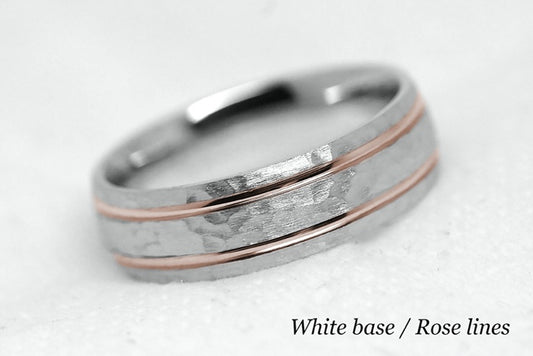 Solid gold hammered wedding ring for men and women with polished lines. Handcrafted in white gold base and rose gold lines