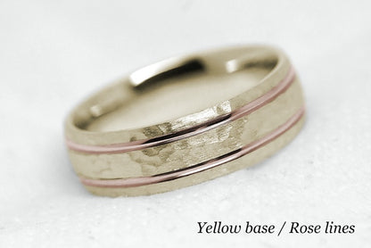 Solid gold hammered wedding ring for men and women with polished lines. Handcrafted in yellow gold base and rose gold lines